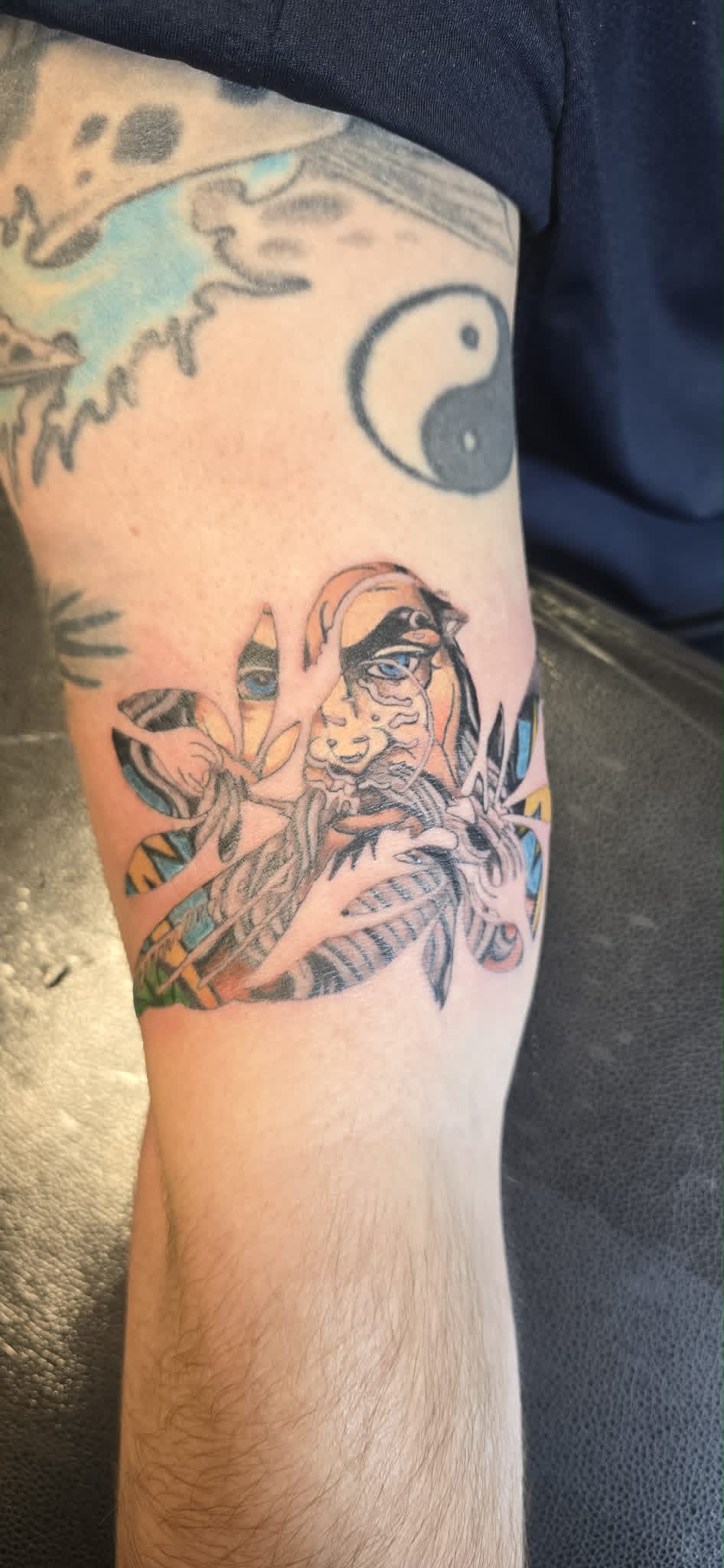 Zeus in the Bayside logo tattoo