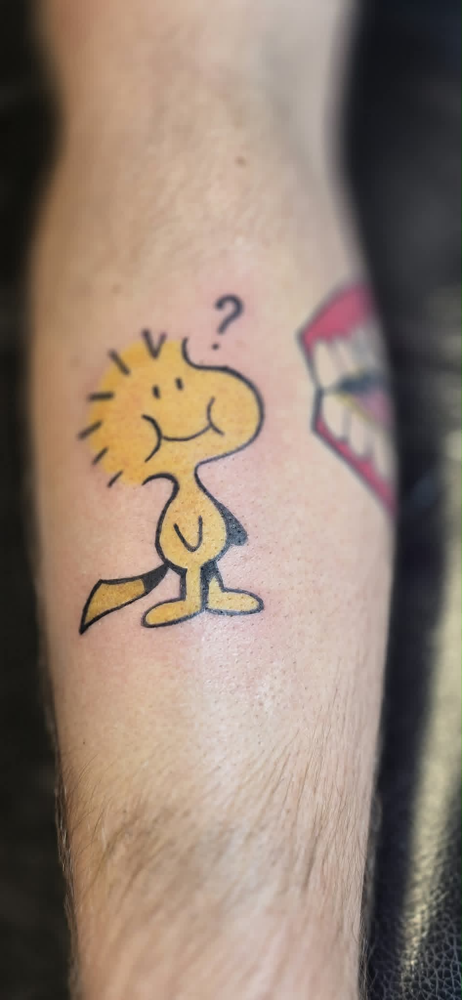 Woodstock Peanuts character tattoo